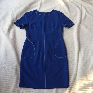 Blue Dress with White Stitching and pockets.